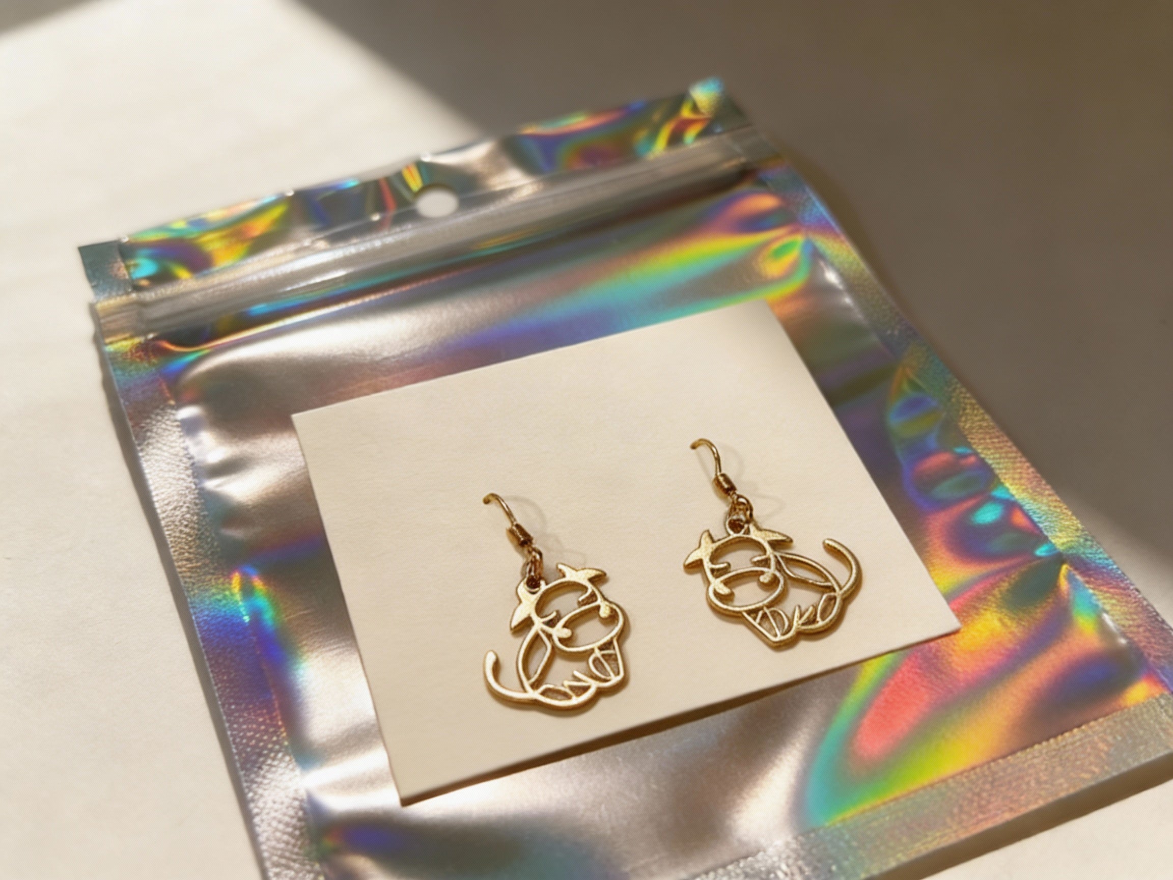 GOLD BULL OUTLINE EARRINGS